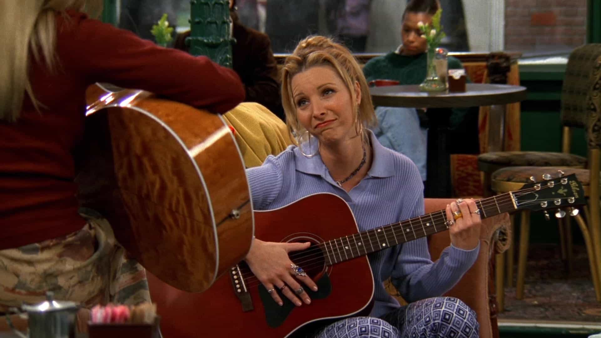 woman learning guitar